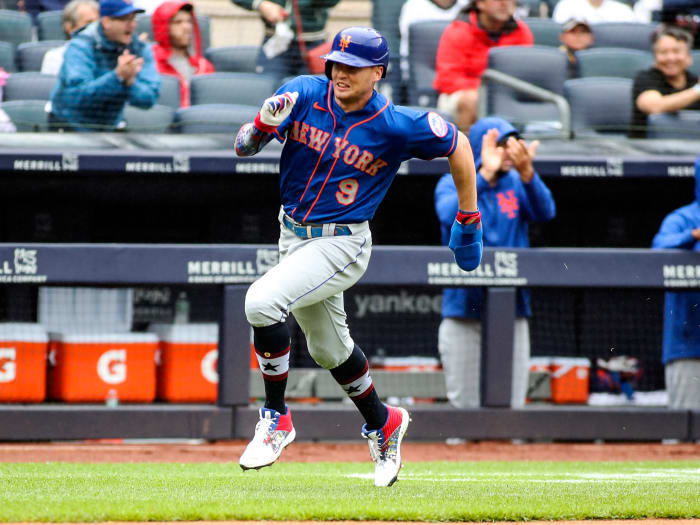 Jul 3, 2021; Bronx, New York, USA; New York Mets center fielder Brandon Nimmo (9) heads home to score the first run of the game in the fifth inning against the New York Yankees at Yankee Stadium.